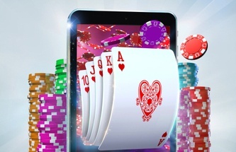 Player playing video poker with strategy card