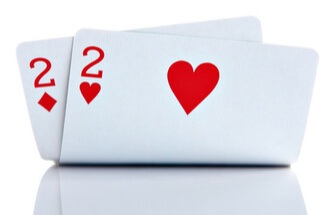 two of hearts and two of diamonds playing cards