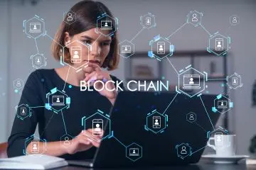 an image of a blockchain as an attractive young woman working on her laptop using blockchain for privacy and security.