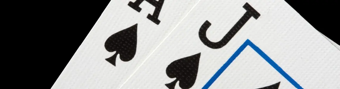 close up of a blackjack with oversized ace and jack of spades
