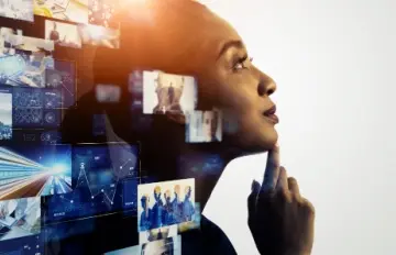 A young woman looking gazing creatively in the distance as thoughts enter her mind