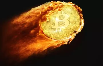 a bitcoin "on fire" hurtling at high speed through space