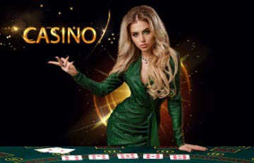 sultry woman blackjack dealer in tight green dress at blackjack table with the word CASINO behind her