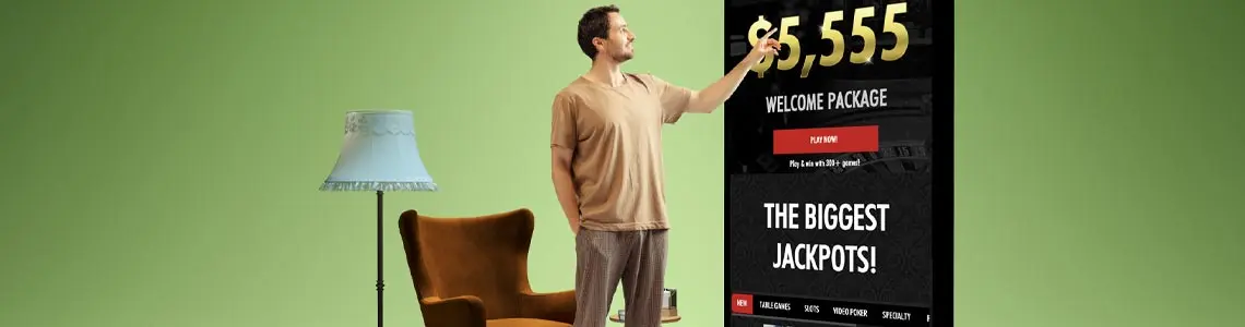 a man standing in his living room with an easy chair and a lamp and a giant smartphone towering above him
