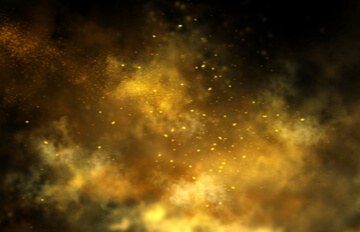 a shower of sparks in various shades of yellow against a brown background that appear to be an image of a galaxy full of stars