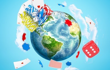 a globe of the world with chips, playing cards, and dice floating around it to show the worldwide reach of online casinos