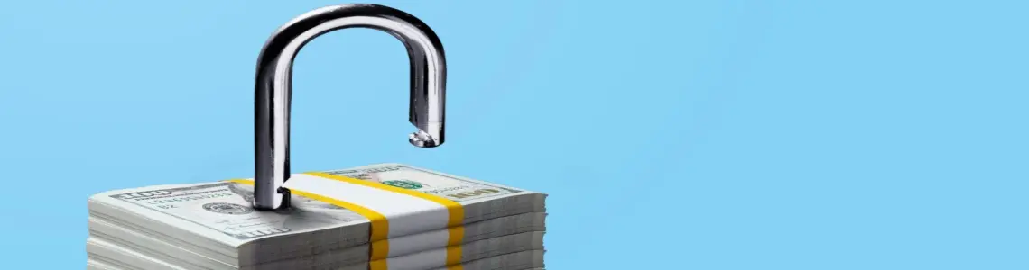 a stack of money with a lock on it demonstrating the safety of depositing money at Everygame Casino Red