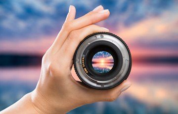 man holding camera lens with saying "when you focus on the good the good gets better"