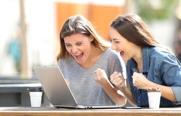 two young woman with laptop