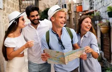 two young couples enjoying a small town together